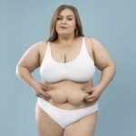 young-oversized-woman-posing-white-lingerie-750×746