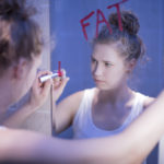 Girl thinking she is fat
