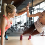 Beautiful women working out in gym