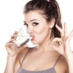 Woman-drinking-water-647×395
