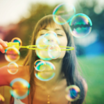 girl-blowing-bubbles
