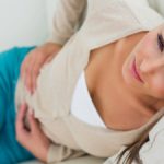 Woman with stomach ache