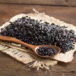 Black rice with a spoon