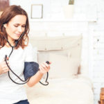 1463345_stockphotopleasantyoungwomanusingtonometer529634683_ls