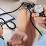 Doctor Measures Pressure In The Patient
