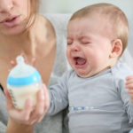 Baby boy crying to have food