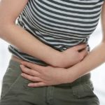 Woman with stomach issues