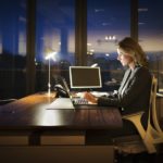 Mature Business Woman Working Late
