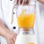 Orange juice smoothie in blender
