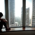 A-lonely-girl-looking-out-014