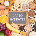 Carbohydrates food sources, top view on a table