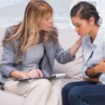 bigstock-Therapist-comforting-a-patient-45837694_0