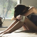 Sad-woman-in-bed-485688-unsplash