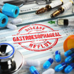 Gastroesophageal reflux disease diagnosis. Stamp, stethoscope, s
