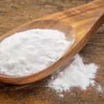 baking-soda-on-a-spoon-which-may-be-used-for-acne