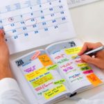 Businessman With Calendar And Diary
