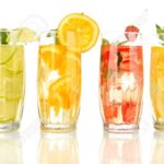 21112884-glasses-of-fruit-drinks-with-ice-cubes-isolated-on-white