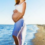 depositphotos_51515993-stock-photo-beautiful-pregnant-woman-with-red
