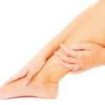 hands-massaging-leg