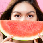 happy-woman-eating-watermelon