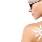 young-woman-with-sun-tan-lotion