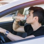 Man-drinking-water