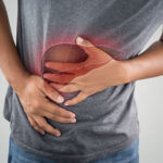 bigstock-The-Photo-Of-Liver-On-Man-s-Bo-243075634
