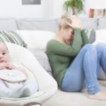 Young woman suffering from postpartum depression