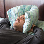 Man Having Trouble Sleeping