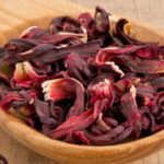 Hibiscus tea on wooden surface