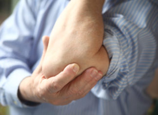 Кои се симптоми на тумор на лактот?