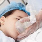 Child patient receiving artificial ventilation