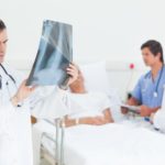 Doctor examining a scan of lungs
