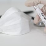 Cropped Hand Of Doctor Holding Test Tube In Laboratory