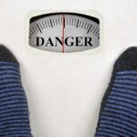 Weight scale showing danger