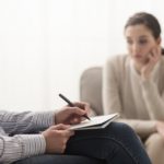 Psychologist listening to her patient