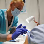 Hundreds queue up as Latvia opens walk-in COVID-19 vaccination scheme