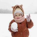 child-enjoying-winter-activities-snow
