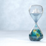 Earth planet in hourglass, Global warming concept