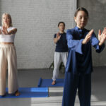 full-shot-women-practising-tai-chi-together