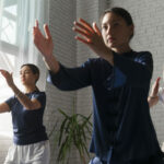 medium-shot-women-practising-tai-chi