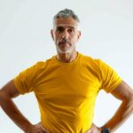 gym-clothes-strong-muscle-fitness-person-workout-gym-with-hands-waist_130412-35235