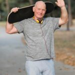 medium-shot-man-with-skateboard-park_23-2148695417