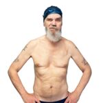 portrait-senior-man-with-swimming-gear_23-2150114433