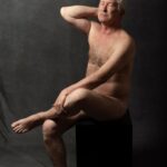 sensitive-old-man-portrait-studio_23-2149436603