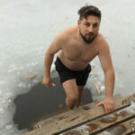 full-shot-man-experiencing-cold-exposure-wellness