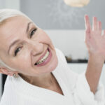 elderly-woman-posing-smiling-wide