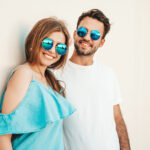 couple-with-sunglasses-posing-street