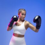 medium-shot-woman-training-with-gloves