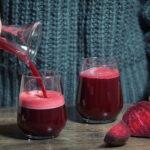 Woman Pouring Self Made Beet Juice